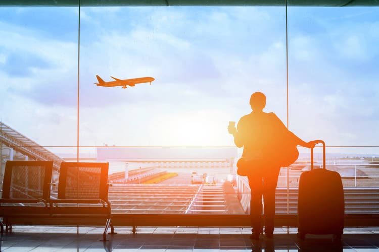 Traveler waiting for the flight in airport.