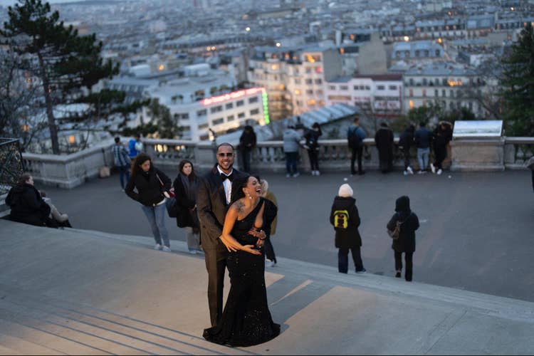 Removing multiple bystanders from the background with Photoshop.
