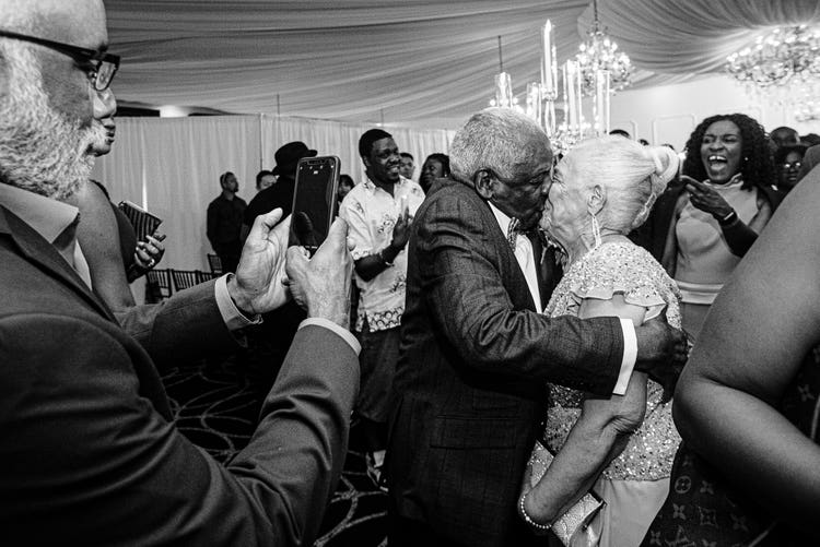 A spontaneous kiss between Grandpa and Grandma.