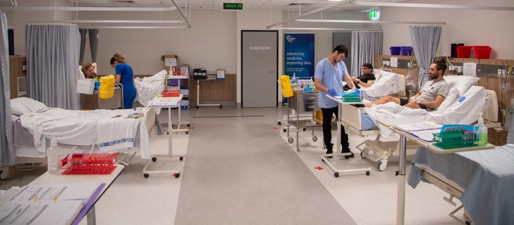 Image of hospital and patients.