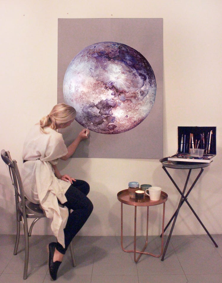 Georgina Kreutzer working on illustration of the moon. 