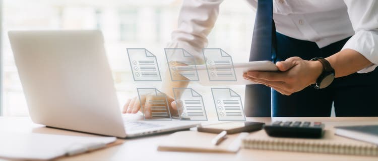 Businessman checking online documents.