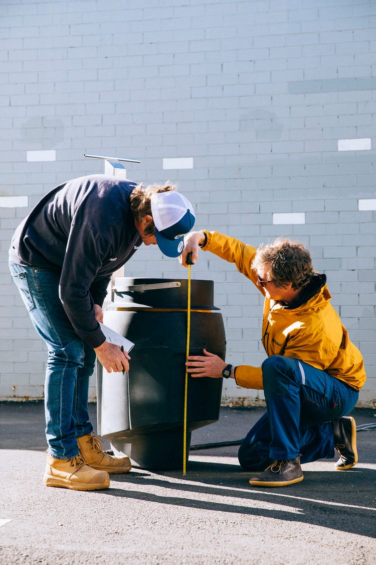 Seabin CEO & Co Founder Pete Ceglinski measuring a Seabin