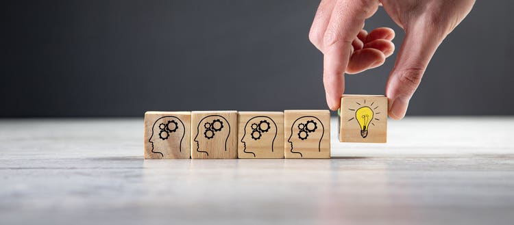 Wooden blocks with a lightbulb.