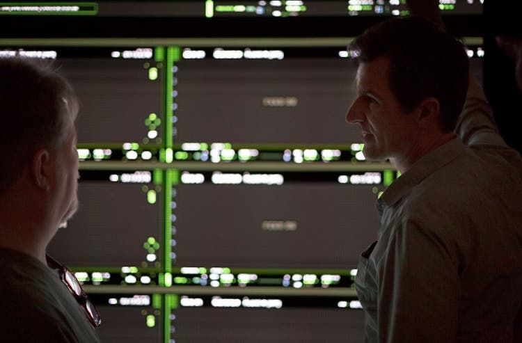Director Joseph Kosinski (right) in a screen test discussing the Darkstar Mission Control graphics. Photo by David Lewandowski.