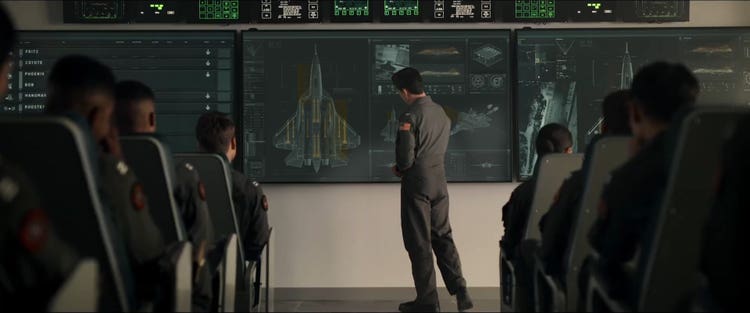 Maverick (Tom Cruise) discusses the new 5th generation enemy fighter jets that the pilots will encounter.
