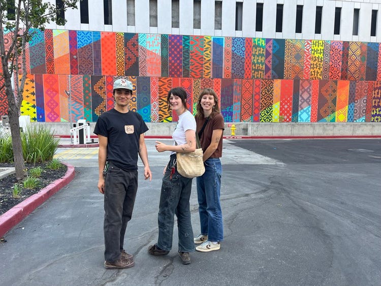 The North Tower Mural in progess with the artists