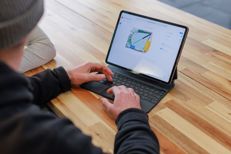 Man using Adobe Acrobat on iPad