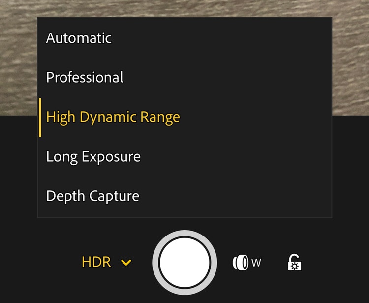 HDR mode is highlighted in the exposure options of the camera module in the Adobe Lightroom mobile app.