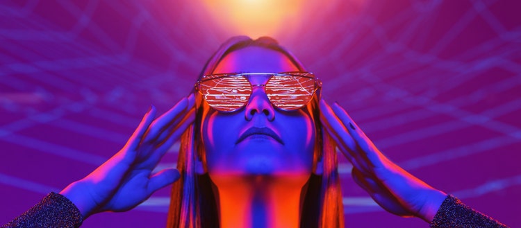Neon close up portrait of young woman in red sunglasses. 80`s video game style.