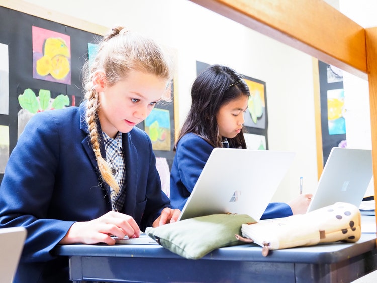Children on laptops at Scotch Oakburn College.