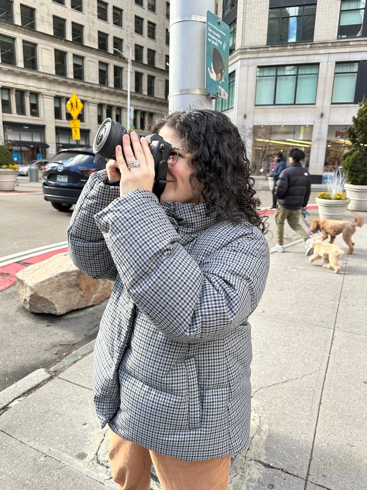 Image of Jamie Cody Rosman taking a photo.