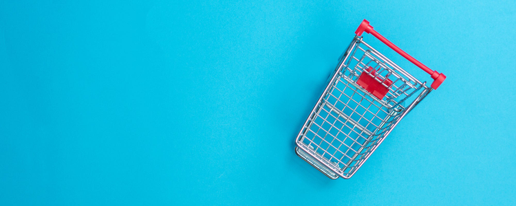 Shopping cart against blue backgroud.