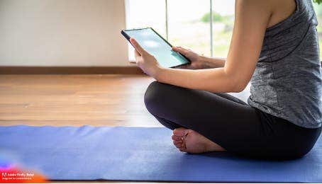 Women on an e-reader.