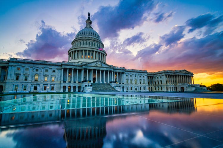 Dramatic sunset over the US capitol in Washington DC.