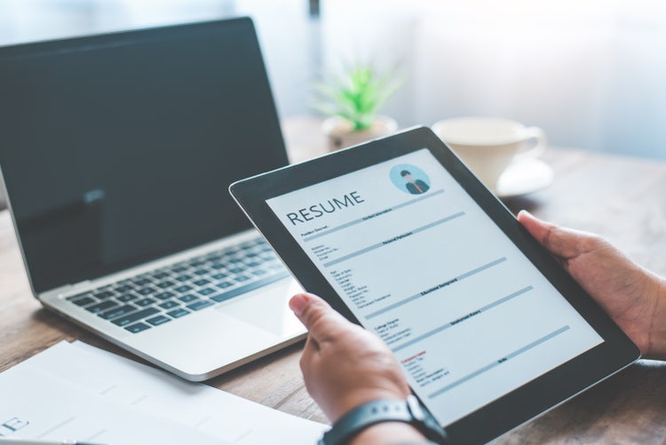 Image of a resume on a tablet.