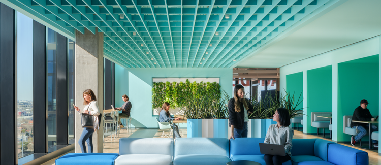 Adobe Employees connecting in the office
