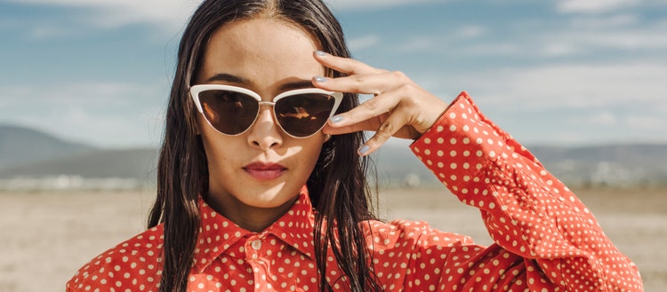 Photo of woman in sunglasses.