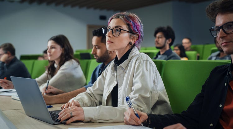 Students in classroom listening.