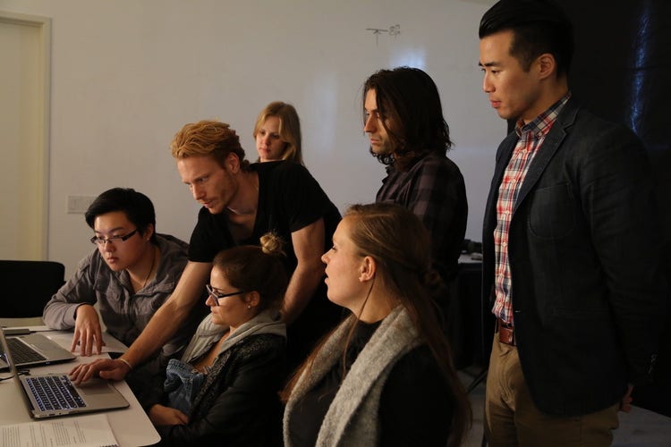 Christoph Geiseler working with a team using Premiere Pro.