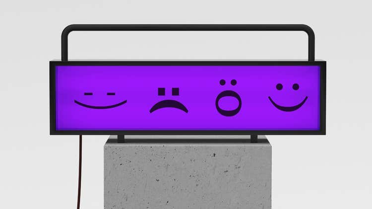 Different faces on a purple background.