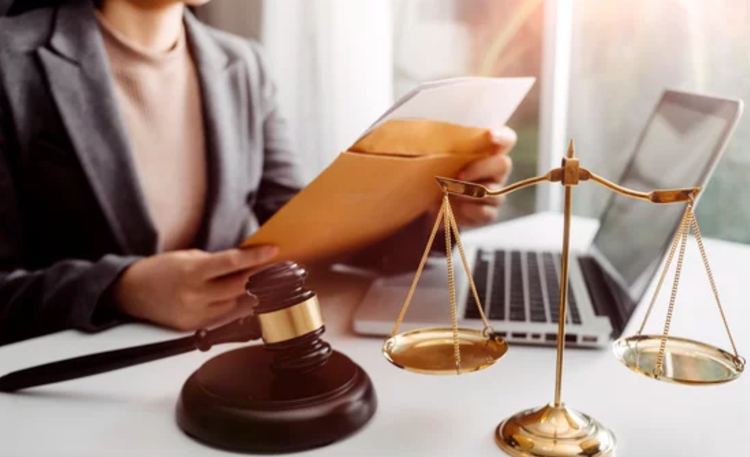 Lawyer looking over documents.