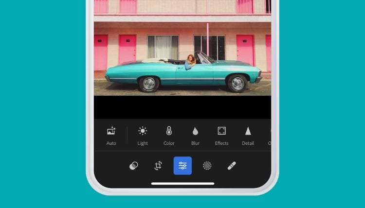 A screenshot of a cell phone, using Lightroom to edit an image of a girl in a car.