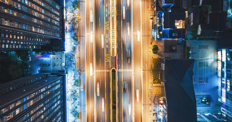 Aerial top view urban cityscape timelapse of traffic on the road with high buildings modern city of Chengdu China