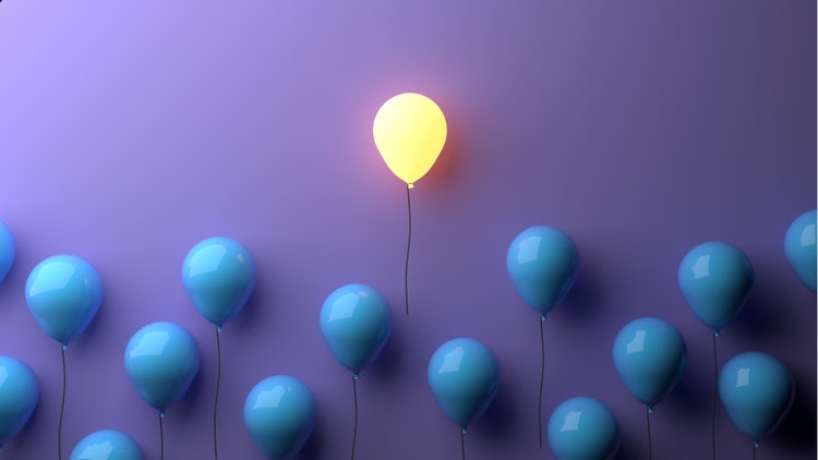 Single balloon lit up above the others.
