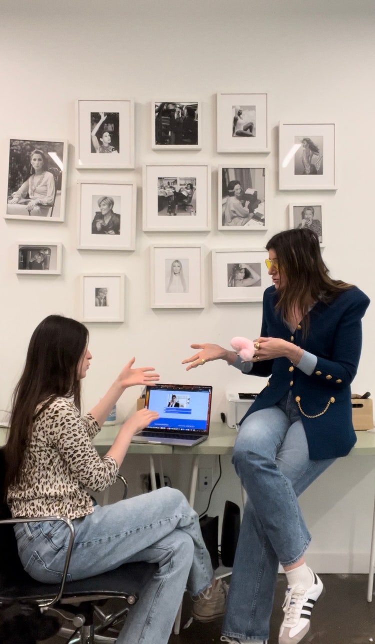 Image of Haley Sacks talking with another woman.
