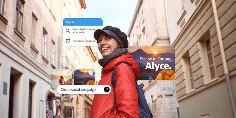 Image of perosn wearing a red jacket and a hat.