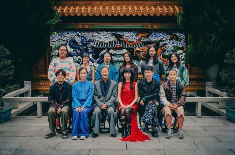 Group of Asian-Australian artists in front of the Chinese Garden of Friendship in Sydney.