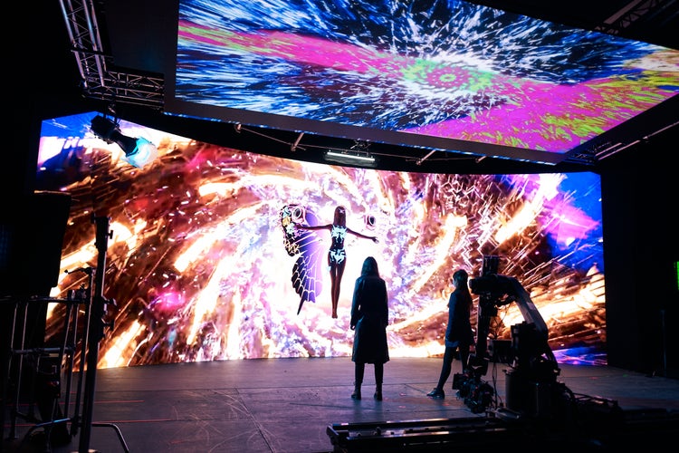 Image of screens showing Generative AI images.