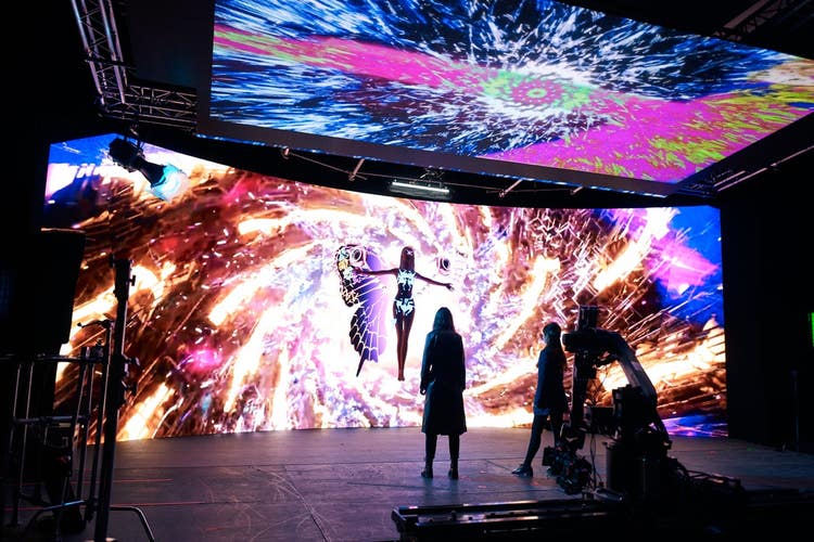 Image of screens showing Generative AI images.