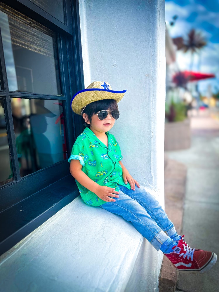 Image of child wearing a hat.