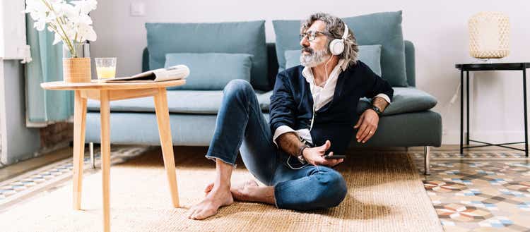 Image of a man with headphones on.