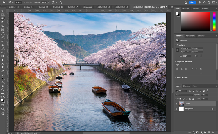 image of boats floating down a river.