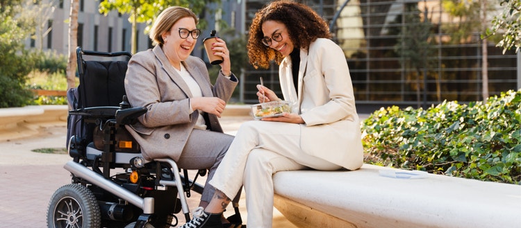 Businesswomen Eating Lunch Together Outside.