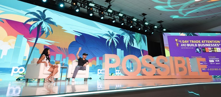 Image of the stage of attendees at POSSIBLE Miami.