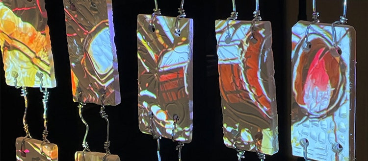Kinetic art created by BRCC students with Adobe Firefly.