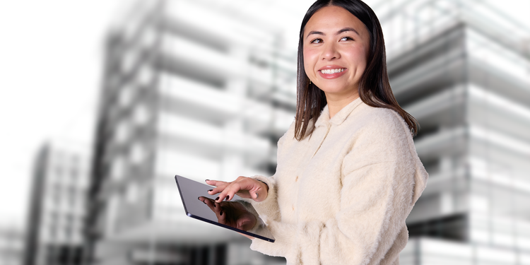 Project engineer at Urban Core, Stephanie Nguyen (Asian, woman), smiling.