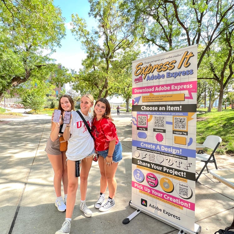 Image of University of Utah students celebrating Adobe Express.