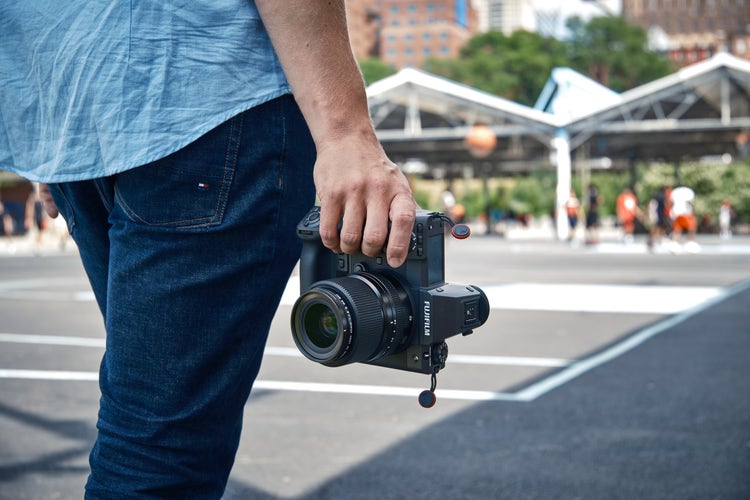 Image of a camera being carried.