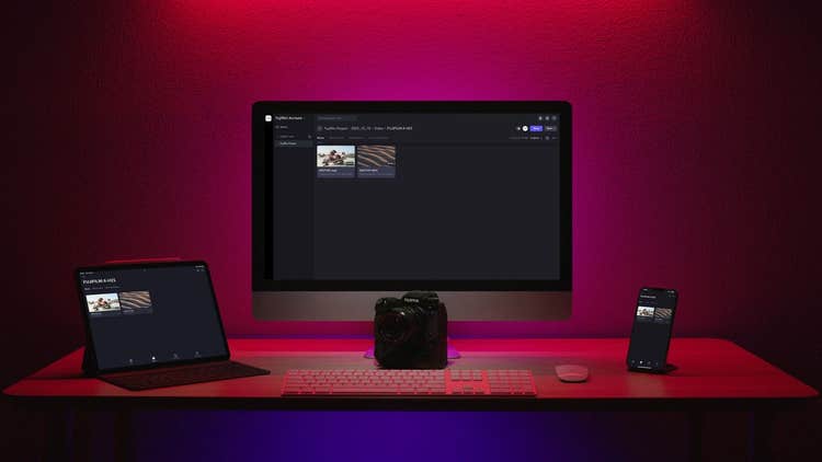 Image of desktop and tablet and phone and camera.