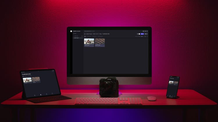 Image of desktop and tablet and phone and camera.