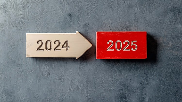 Block arrow engraved with 2024 pointing towards a new block with 2025 on it