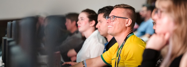 Group of people attending Adobe MAX.