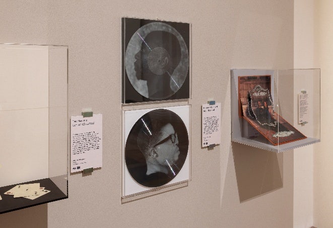 A close-up of a wall with pictures AI-generated content may be incorrect.