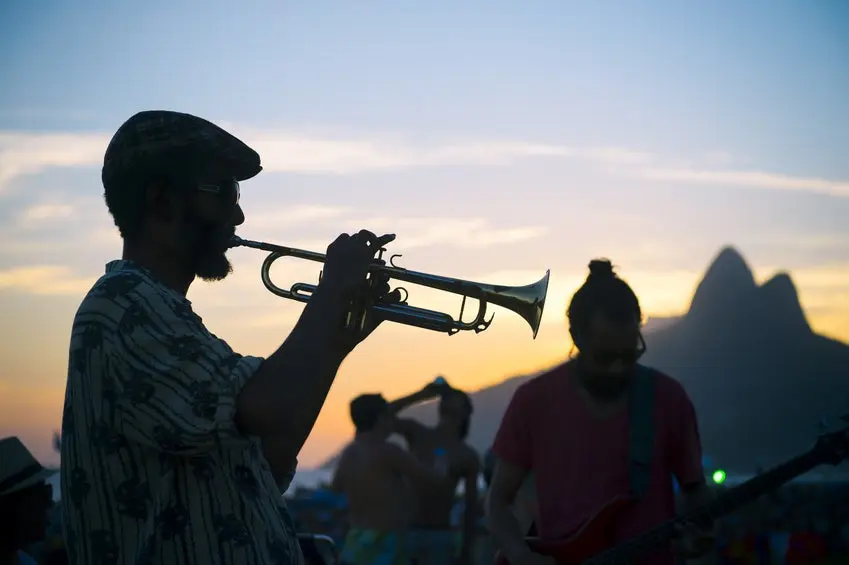Silhouettes of Musician and Audience Arpoador Rio Brazil