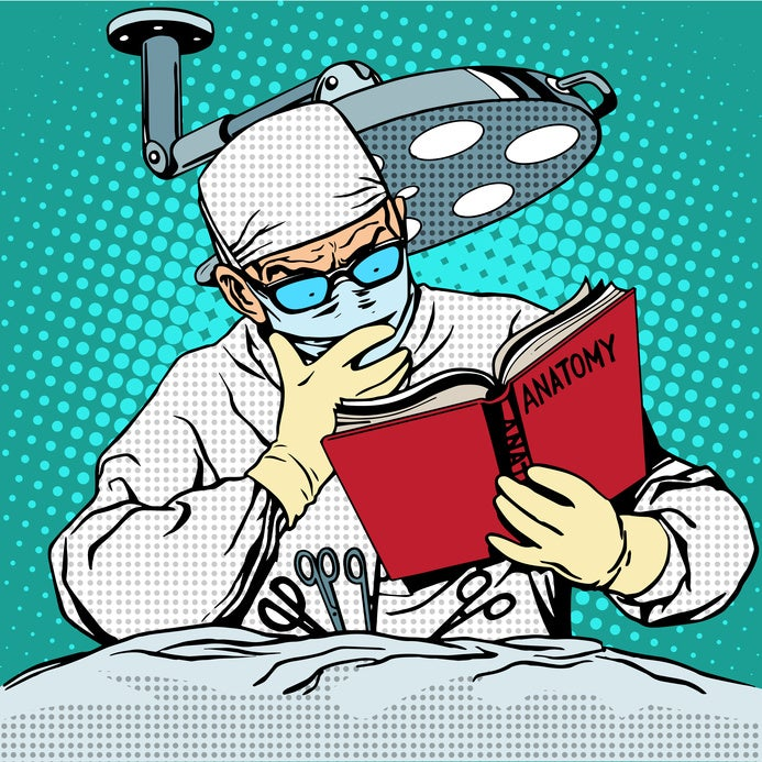 The surgeon before surgery is reading anatomy. Medicine and heal